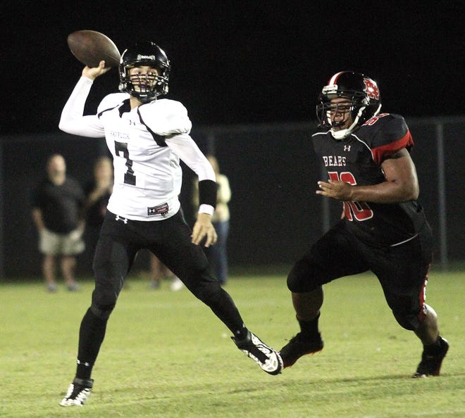 Havelock's Travis Sabdo throws the ball in last year's game against New Bern. The county rivals are scheduled to kick off at 7 p.m. today at Havelock High.