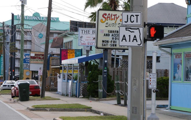 Longtime small businesses and vacant buildings line Daytona Beach’s signature gateway, International Speedway Boulevard, as the road heads toward the beach and hotels.