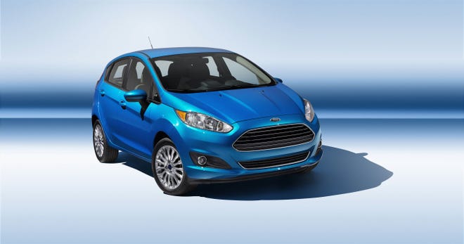 The 2014 Fiesta sports a new grille, hood and tapered lines.