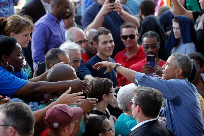 President Obama greets the crowd after speaking at Laborfest 2014 in Milwaukee on Labor Day.