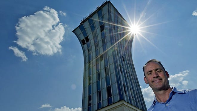 Greg Weaver with Catellus stands in front of the old Mueller Tower. Officials with Catellus have fielded a steady stream of offers to make something of the tower — a bar, or restaurant, or Austin’s most exclusive condominium — and gently rebuffed them all.