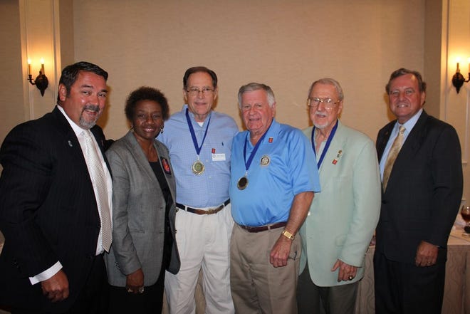 Pictured from left to right are: Dale Spaht, Tony Malbrough, and Gordon Crawford, Gonzales Rotarians, (center from left to right) were honored by Rotary District 6200 Governor, Ezora Proctor (second from left) for belonging to Rotary for 40 or more years. Also pictured are Gonzales Rotary President, Tim Pujol (left), and Rotary District 6200 Assistant District Governor, Ken Firmin (right).
