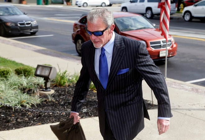Indianapolis Colts owner Jim Irsay enters Hamilton County court in Noblesville, Ind., Tuesday, Sept. 2, 2014. Irsay is scheduled to appear in court for a change-of-plea hearing on drug-related charges he faces from a traffic stop in March.