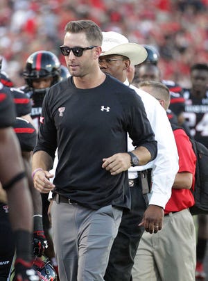 Texas Tech's Kliff Kingsbury leaves the field at halftime against Central Arkansas during their game on Saturday in Lubbock. (Tori Eichberger/AJ Media)