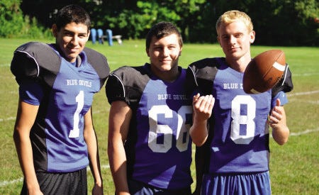 Ryan O’Leary photo 
Epping-Newmarket football captains (from left) Jeremy Espo, Alex Santos and Alex Hackett are ready to lead the Blue Devils in Division III after an offseason full of change.