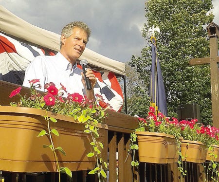 Former U.S. Sen. Scott Brown, who is in a primary election for the U.S. Senate seat held by Sen. Jeanne Shaheen, speaks to those gathered Thursday afternoon at a Republican get-out-the-vote rally outside the 401 Tavern in Hampton.