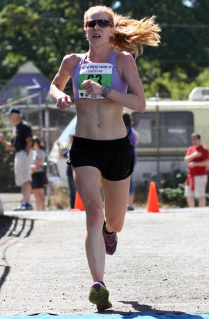 Renee Gordon won the women's portion of the second annual Hop Valley Brews Cruise 5K with an official time of 18 minutes, 14 seconds. (Alan Sylvestre/The Register-Guard)