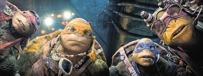 This image released by Paramount Pictures shows characters, from left, Raphael, Michelangelo, Leonardo, and Donatello in a scene from "Teenage Mutant Ninja Turtles." (AP Photo/Paramount Pictures, Industrial Light & Magic)