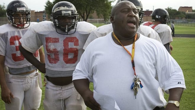 Coach Darrell Crayton leads Eastside Memorial through a football practice in 2008. The Panthers, who will play a “non-honors” schedule this fall and won’t be eligible for the playoffs, lost to Lanier 35-6 last week.