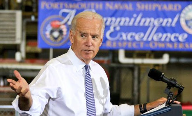 Vice President Joe Biden addresses a packed house in Building 92 at Portsmouth Naval Shipyard on Wednesday.