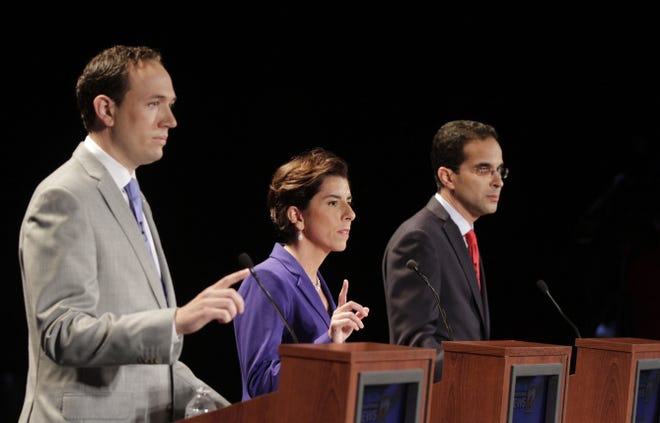 Clay Pell, left, R.I. General Treasurer Gina Raimondo and Providence Mayor Angel Taveras spar Tuesday night at a debate for the Democratic candidates for governor sponsored by WPRI and The Providence Journal.