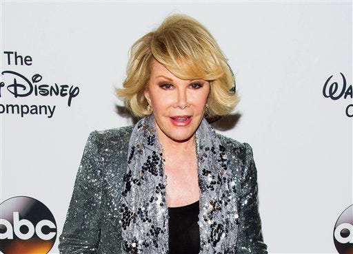 In this May 14, 2014 file photo, TV personality Joan Rivers attends A Celebration of Barbara Walters in New York. Melissa Rivers announced Thursday, Sept. 4, that her mother Joan died Thursday, in New York. Rivers was hospitalized Aug. 28, after going into cardiac arrest at a doctor's office.