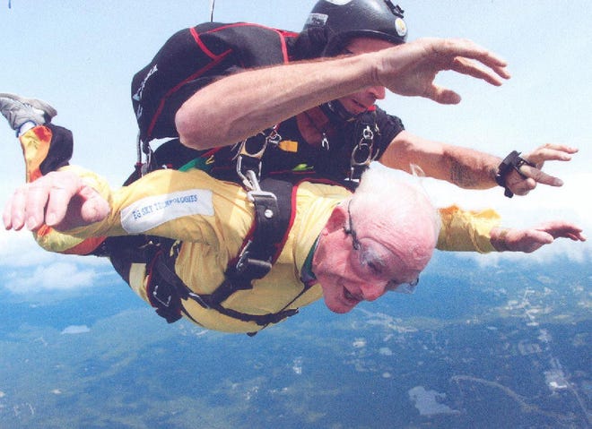 Don Robinson jumps from plane with Tony Guilliano.