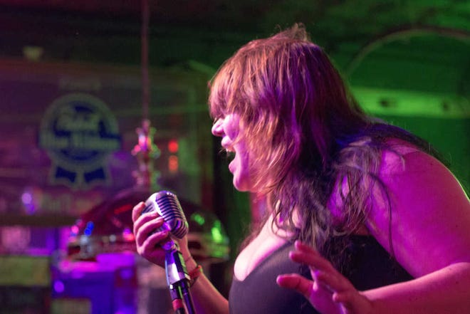 Lead singer Jericka Millsap, of Kansas City-based heavy rock band Arya, performs Aug. 29 during the band's first show in Topeka at The Boobie Trap Bar, 1417 S.W. 6th.