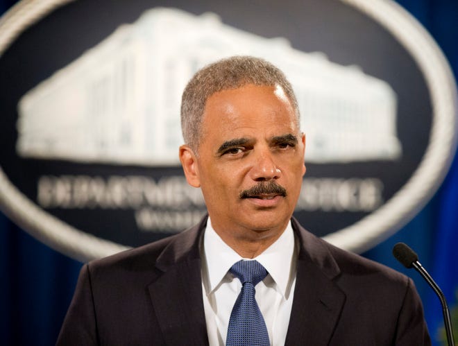 Attorney General Eric Holder speaks during a news conference at the Justice Department in Washington, Thursday, Sept. 4, 2014, to announce the Justice Department's civil rights division will launch a broad civil rights investigation in the Ferguson, Mo., Police Department.