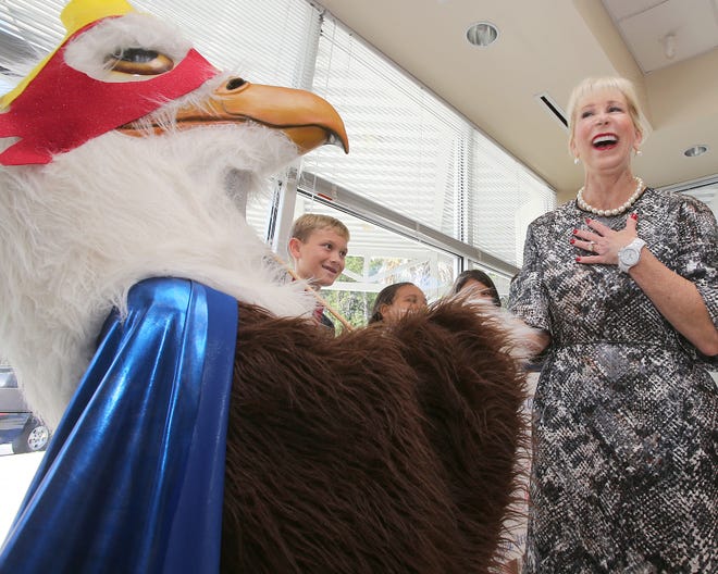 Florida first lady Ann Scott meets Super Eagle Jake Pendergrass, 10, during her visit to Southport Elementary on Thursday.