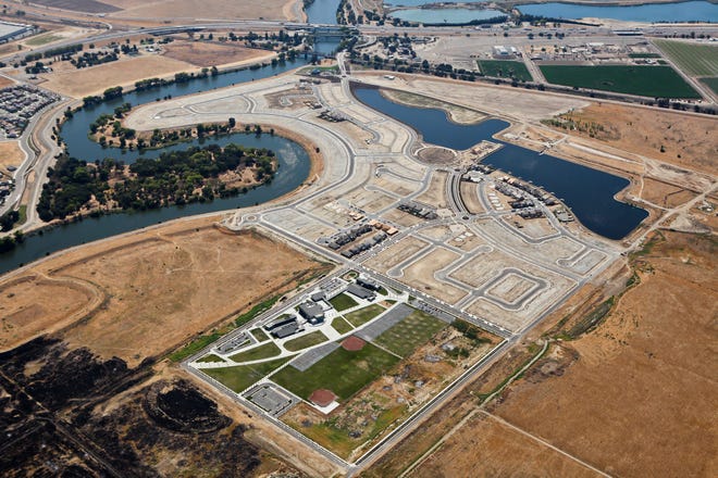 The River Islands development along the San Joaquin River in Lathrop, as seen from the air in late August, finally is opening,more than 25 years after it was planned. COURTESY VIEWPOINT AERIAL PHOTOGRAPHY
