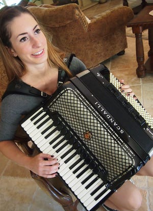 Stockton resident Christina Mariani plays the accordion.CALIXTRO ROMIAS/THE RECORD