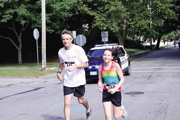 CONTRIBUTED PHOTOs
Jim and Emma Flanagan of Fairhaven ran last year.