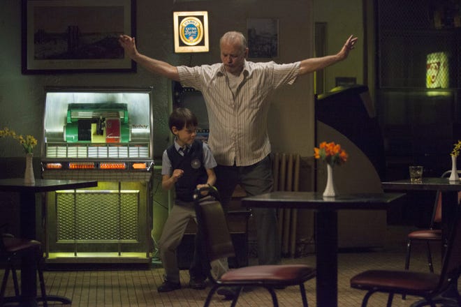 This image released by The Weinstein Company shows Bill Murray, right, and Jaden Lieberher in a scene from the film, "St. Vincent," which premiered at the Toronto Film Festival.