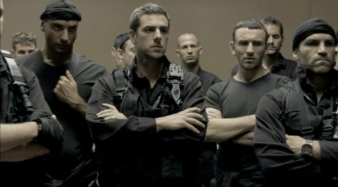 Yiftach Klein, center, plays the leader of an elite anti-terrorism defense squad in the movie “Policeman,” which is playing Tuesday at the Hippodrome Cinema.