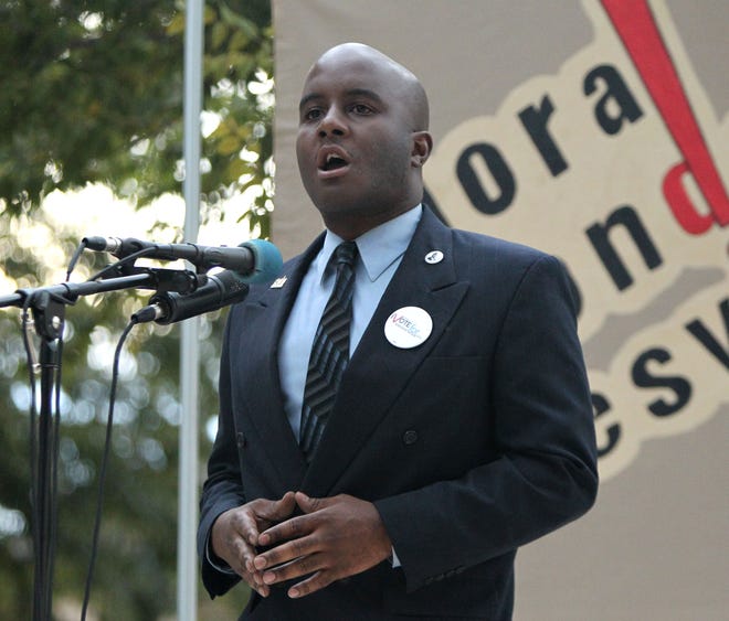 Jeremy Ponds, a national speakers with the Southern Christian Leadership Conference, delivers a message to the people gathered for Moral Mondays Gainesville, at the Alachua County Courthouse in Gainesville Sept. 8, 2014.
