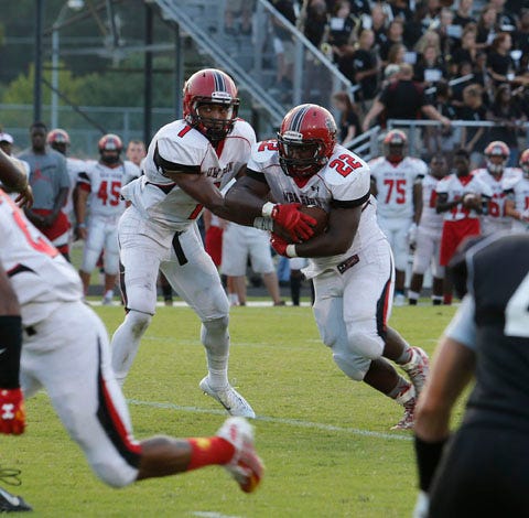 New Bern running backs D.J. Howard and Ray’shi Bolds, 22 in the photo, have provided a powerful one-two punch in the Bears’ backfield. Both running backs scored their first and second touchdowns in last week’s 42-6 win over West Craven.