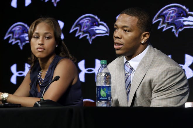 FILE - In this May 23, 2014, file photo, Baltimore Ravens running back Ray Rice, right, speaks alongside his wife, Janay, during a news conference at the team's practice facility in Owings Mills, Md (AP Photo/Patrick Semansky, File)