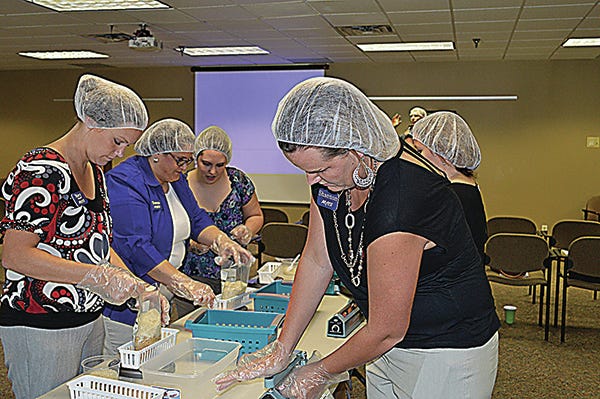 Arvest-Bartlesville launches its part of the 1 Million Meals initiative with a Feed the Funnels party in early August at its East Side Branch, which involved all 195 associates participating in an assembly-line packaging event. By the end of the day, more than 10,200 packaged meals were ready to be delivered to designated food partners.