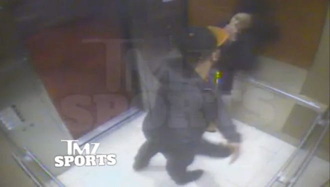 FILE - In this February 2014 file photo from a still image taken from a hotel security video released by TMZ Sports, Baltimore Ravens running back Ray Rice punches his fiancee, Janay Palmer, in an elevator at the Revel casino in Atlantic City, N.J. A law enforcement official says he sent a video of Ray Rice punching his then-fiancee to an NFL executive five months ago, while league officers have insisted they didn't see the violent images until this week. The person played The Associated Press a 12-second voicemail from an NFL office number on April 9 confirming the video arrived. A female voice expresses thanks and says: "You're right. It's terrible." (AP Photo/File)