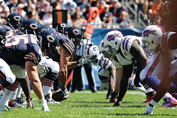 Chicago Bears center Roberto Garza prepares to snap the ball against the Buffalo Bills on Sunday during the first half of their game in Chicago.