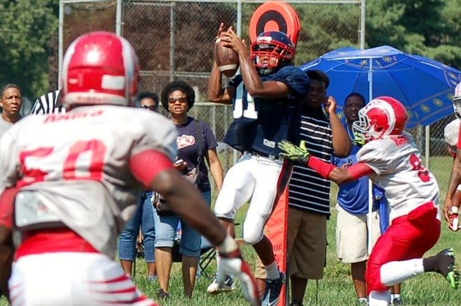Willingboro receiver Isiah Harrison (11) pulls in a pass during a preseason scrimmage