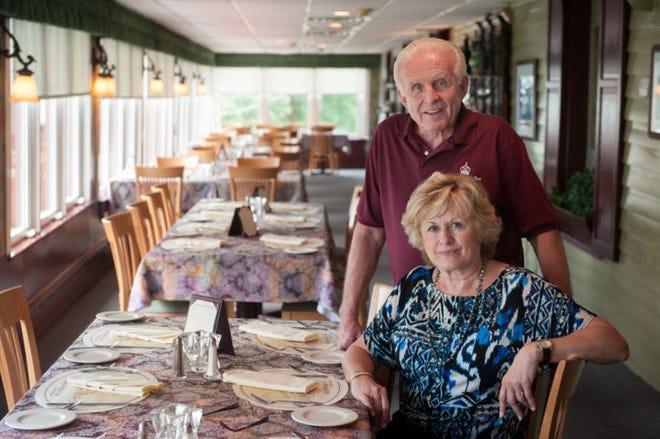 Owners Len and Mary DeMenczuk sit in one of the dining rooms at Bucks County's best location for American food, The King George Inn II, situated on Radcliffe Street in Bristol Borough.