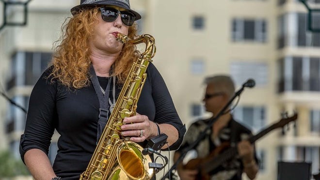 Debbie Pierce of the Debbie Pierce Band and Jazz Quartet performs at the first “Jazz Along the Intercoastal” outdoor concert at Veterans Park in Delray Beach, on Sept. 7, 2014. (Thomas Cordy / The Palm Beach Post)