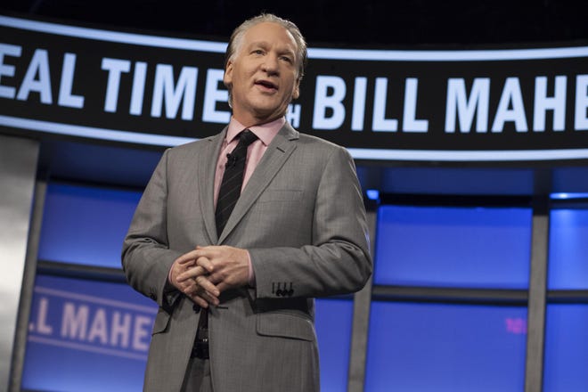 FILE - In this Jan. 25, 2013, file photo provided by HBO, Bill Maher hosts "Real Time with Bill Maher" in Los Angeles. Maher will travel to Washington, D.C., for a special live "Real Time" at 9 p.m. on Friday, Sept. 12, 2014, followed by a live standup special from the Warner Theatre titled "Bill Maher: Live From D.C." (AP Photo/HBO, Janet Van Ham, File)