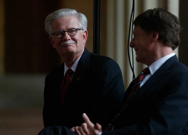 Former Texas Tech President Jon Whitmore,left, sits next to Chancellor Robert Duncan during a ceremony in Whitmore's honor on Friday in Lubbock. Whitmore served as president of Tech from 2003 to 2008.