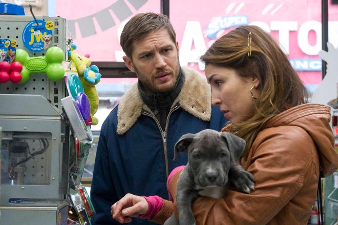 This photo released courtesy of Fox Searchlight shows Tom Hardy, left, as ìBobî and Noomi Rapace as ìNadia," in the film, "The Drop." (Copyright Twentieth Century Fox, Fox Searchlight, Barry Wetcher)