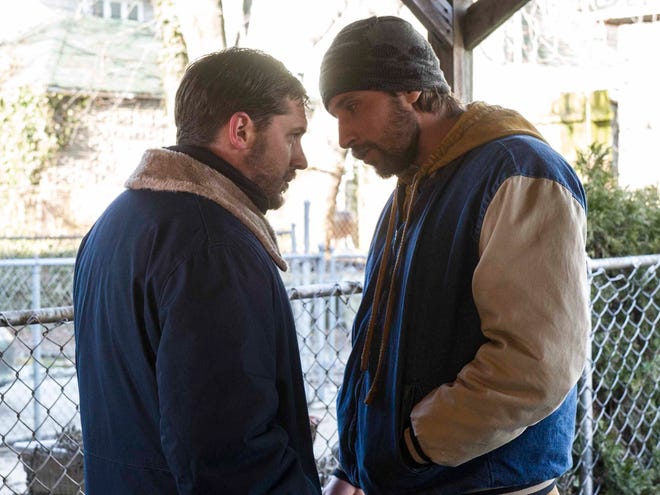 Tom Hardy, left, and Matthias Schoenaerts in a scene from “The Drop.” (Fox Searchlight Pictures)