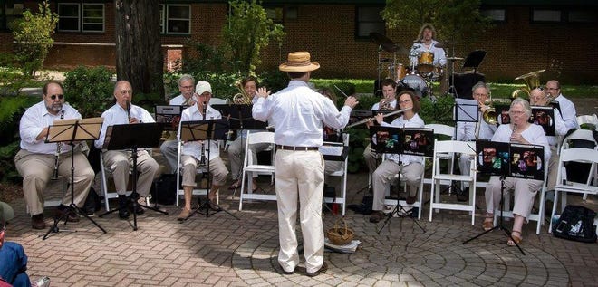 Members of the Wellesley Town Band under the direction of Henry Platt welcoming visitors to Elm Bank's annual spring Gardeners' Fair. Courtesy photo