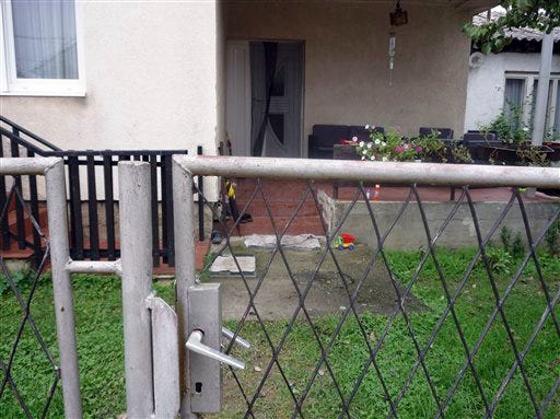 The entrance of the house where David Haines, the British hostage beheaded by extremists, lived with his wife and four-year-old daughter in Sisak, central Croatia, Sunday, Sept. 14, 2014. Haines is the third Westerner beheaded in recent weeks by the Islamic State group, which has seized vast swaths of territory in Syria and Iraq. The first two were U.S. journalists.