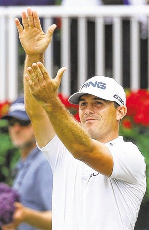 Curtis Compton/The Associated Press
Billy Horschel does the Gator chomp after winning the Tour Championship and the Fedex Cup on Sunday in Atlanta.