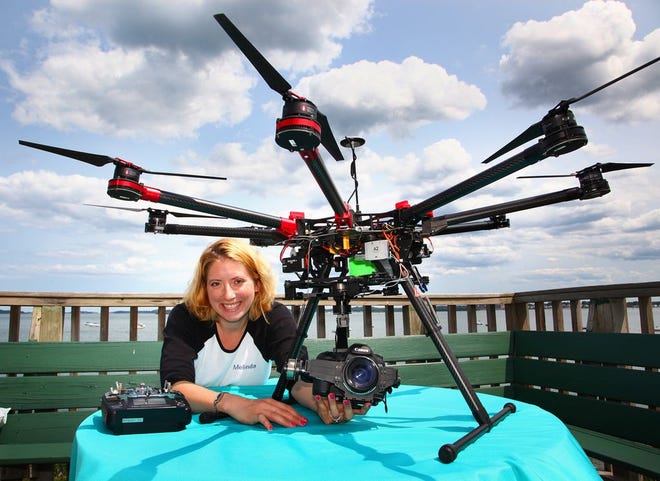 GARY HIGGINS/The Patriot Ledger
Melinda Sokoloski of Quincy co-founded MS Aerial, a business that takes aerial photos from what are commonly called drones. The photo was taken on Wednesday, July 30, 2014.
