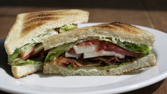 If you’re looking for a different spin on the BLT, hold the mayo and think sweet and crunchy with apple slices and cider aioli. (Patricia Beck/Detroit Free Press/MCT)