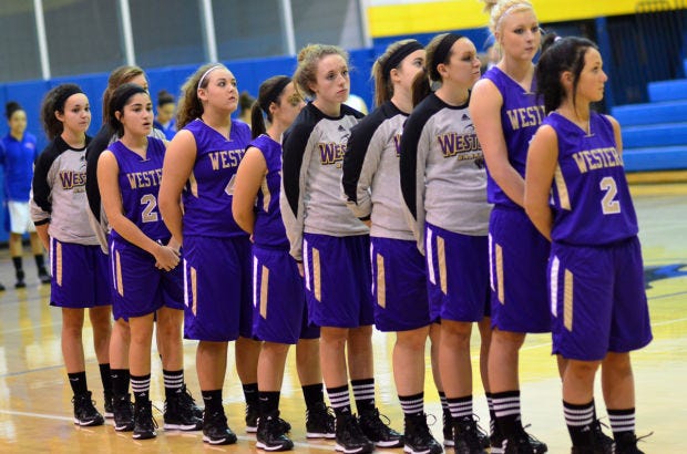 The Western Beaver girls basketball team line up for the national anthem before a Dec. 12, 2013, game against Cornell.