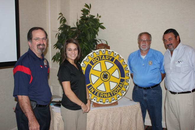 Pictured from left to right are: Brian Girardot, Community Coffee; Sydney Reech, Community Coffee; Gonzales Rotarian, Bobby Schexnayder; and Tim Pujol, President, Gonzales Rotary Club.