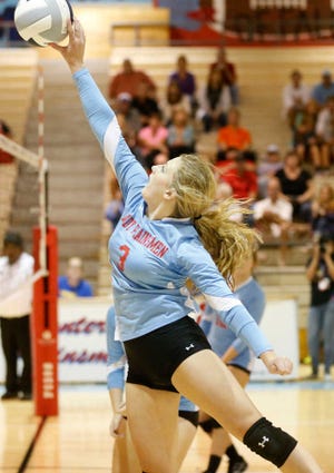 Monterey's Lexi Bandy hits the ball against Seminole Tuesday in Lubbock. (Tori Eichberger AJ/Media)