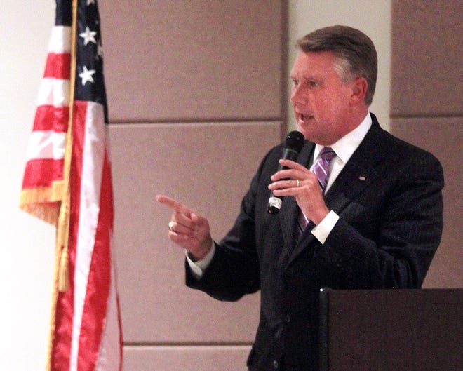 The Rev. Mark Harris, former U.S. Senate candidate and pastor of First Baptist Church in Charlotte, speaks during the God and Country Banquet Monday at the Havelock Tourist and Event Center.