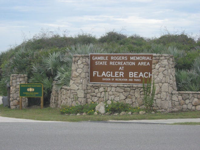 Flagler Beach officials have decided not to pursue a name change for the state park on State Road A1A that was renamed in honor of Florida folk singer Gamble Rogers in 1992.