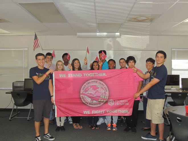 Helping to kick off the annual Pink Army fundraiser are, from left, Paul Schattino, Antowan Scarbough, Greg Doston, Autumn Leishman, Kayla Carreras, Janexis Torres, Erica Veney, Steven Medeiros, Jodee Soltes, Justin Grimes and Joseph Jones.