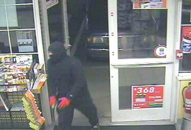 This surveillance footage from the Irving Circle K in Durham early Tuesday morning shows a gunman entering the store.